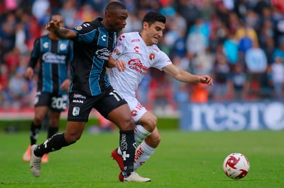 Gallos Blancos se hizo del triunfo en la cancha del estadio La Corregidora, gracias a los goles de Ariel Nahuelpán, Marcel Ruiz y Fabián Castillo. (AGENCIAS)