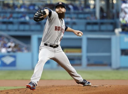 Dallas Keuchel jugó sus primeras siete temporadas en Grandes Ligas con los Astros de Houston. (ARCHIVO) 