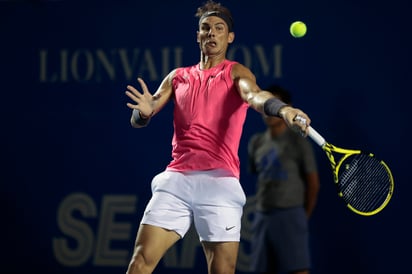 Rafael Nadal no tuvo inconvenientes para derrotar 6-3, 6-2 a Pablo Andújar. (AP)