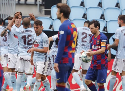 Jugadores del Celta de Vigo celebran el tanto del empate, que fue anotado por Iago Aspas al minuto 88. (EFE)