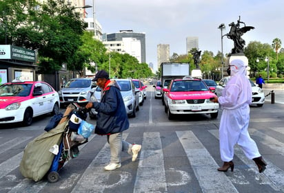 La pandemia del nuevo coronavirus no termina de controlarse en América Latina y el Caribe, lo que llevará al PIB regional a contraerse un histórico 9.1 % en 2020. (ARCHIVO) 