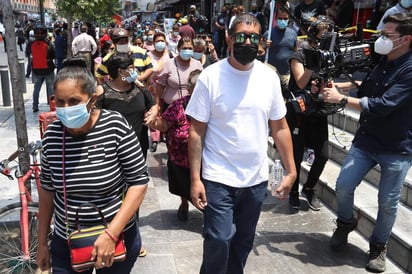 Familiares de los mineros sepultados en la mina de Pasta de Conchos durante su visita al Palacio Federal en agosto.
