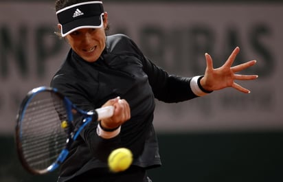 Garbiñe Muguruza no pudo avanzar a los octavos de final, luego de perder 7-5, 2-6, 6-4 ante Danielle Collins. (EFE)