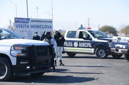 En la víspera de Noche Buena inició en Monclova el operativo 'Bienvenido Paisano, la Guardia Nacional te acompaña a tu destino', acción coordinada con cuerpos policiacos de los tres órdenes de gobierno. (SERGIO A. RODRÍGUEZ)