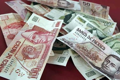 El peso mexicano acumuló un saldo negativo frente al dólar durante 2020, ante los estragos económicos de la pandemia del COVID-19. (ARCHIVO)