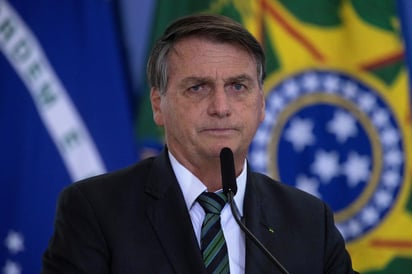 El presidente de Brasil, Jair Bolsonaro, afirmó este martes que Brasil y Francia deben ser 'ser amigos', tras las diferencias mantenidas en los últimos meses con su homólogo francés, Emmanuel Macron, por la política ambiental defendida por su Gobierno. (EFE)
 