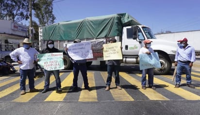 Este viernes activaron un bloqueo carretero en el crucero de Hacienda Blanca, en la ciudad de Oaxaca, bajo esa demanda.
(EL UNIVERSAL)