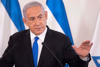 El primer ministro israelí, Benjamín Netanyahu, aseguró hoy que está 'decidido' a seguir con la operación militar en Gaza, poco después de hablar con el presidente de EUA, Joe Biden, que le urgió a llevar a cabo 'una desescalada significativa' hoy mismo. (EFE) 
