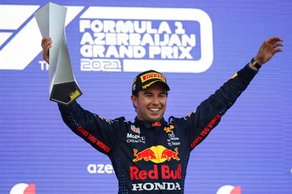 El piloto mexicano de Fórmula 1 de Red Bull Sergio Pérez declaró que es un 'gran impulso' para el equipo saber que tienen dos coches que pueden luchar por el campeonato, y que 'todo el equipo quiere ganar'.
(ARCHIVO)