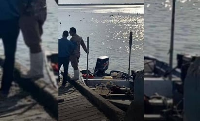 El cuerpo del hombre de mar fue llevado por sus compañeros pescadores al muelle de Yavaros. (ESPECIAL)