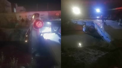 Pasajera y sus hijos son rescatados tras caer el auto en el que viajaban a canal de riego en Torreón