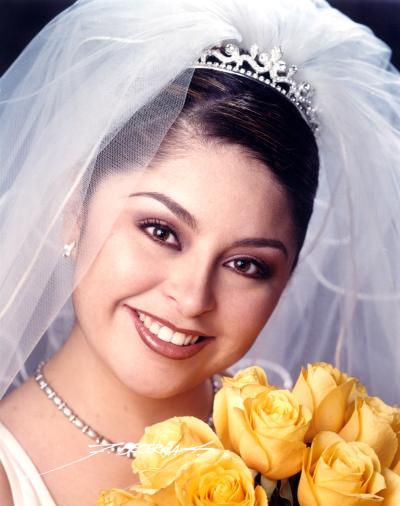 Lic. Elba Lucila Olvera  Gutiérrez contrajo matrimonio con el Ing Absalom Ruiz Rosales el 21 de Marzo de 2003.