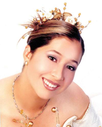 Srita. Margarita Martínez Moreno celebró sus quince años de vida con una misa de acción de gracias en la iglesia El pueblito, el sábado ocho de noviembre de 2003.