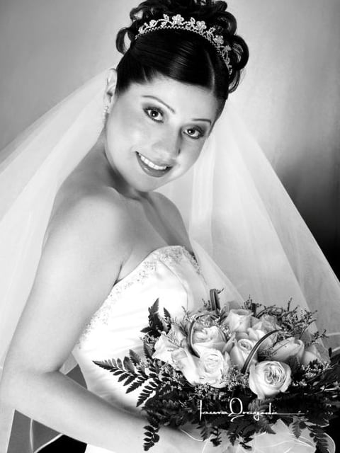 C.P. Claudia Iliana Tabares García el día de su enlace nupcial con el C.P. José Arellano Ramírez

Estudio Laura Grageda.