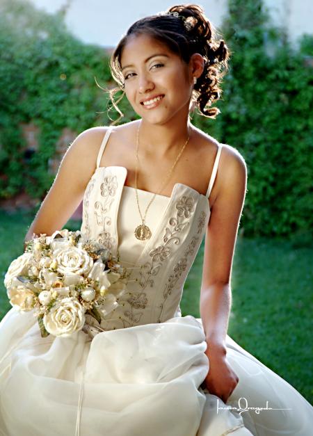 Srita. Marisela Monserrat Rodríguez Dávila celebró sus quince años de vida con una misa de acción de gracias el seis de marzo de 2004.