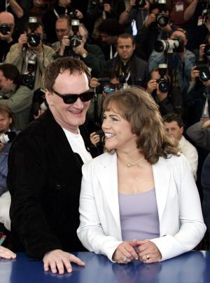Kathleen Turner en compañía de Quentin Tarantino.