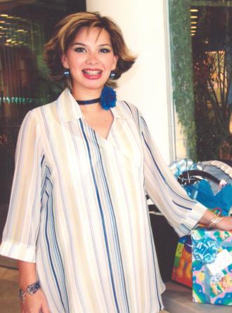 Karime Ceballos de Rodríguez, feliz en su festejo de canastilla.