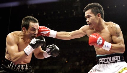 En sangrienta pelea de la función denominada Cuenta Pendiente y que correspondió a las expectativas, Pacquiao terminó arriba en las tarjetas de los jueces 115-112 y 114-113 y en otra Márquez ganó 115-112, para el fallo dividido.