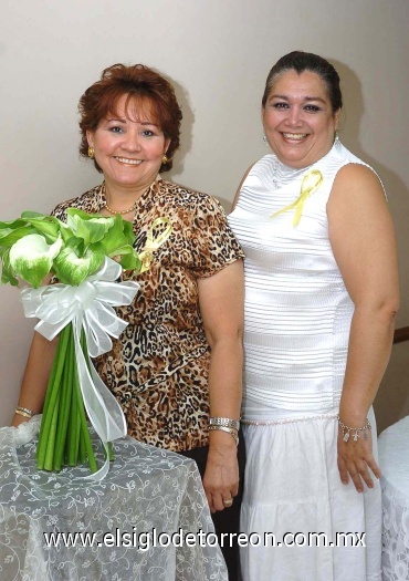 27052008
Yolanda de la Rosa de Gutiérrez finalizó su temporada como presidenta del Club de Jardinería Clivia, y cedió su lugar a Ana María Álvarez de Avelar.