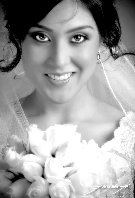 LAE. Claudia Araceli Woo González el día de su boda con el Ing. Yamil Alberto Dipp Domínguez.

Fotografía de Flavio Becerra.
