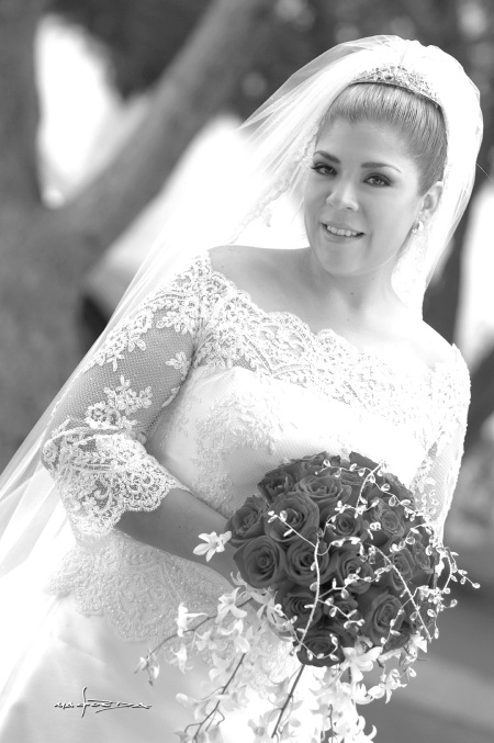 Lic. Ángeles Dávila López el día de su boda con el Arq. Cristóbal Jaime Gómez. 

Maqueda Fotografía