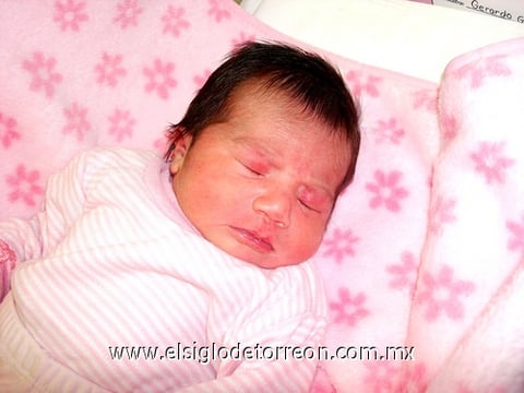 09032010 Felices. Annete en los brazos de su mamá Jannete Díaz Ceballos de Tueme y  su papá Mauricio Tueme Habib.