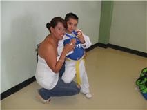 Nino Diego Alejandro Lozano S. donde quedo en segundo lugar en cinta amarilla en Gómez Palacio Dgo. abril 6 de 2011. con su mami la Sra. Alejandra Soto Castorena. Fotografía enviada por Alicia Castorena.