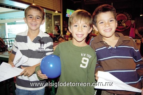 Neto, Adolfo y Romel.