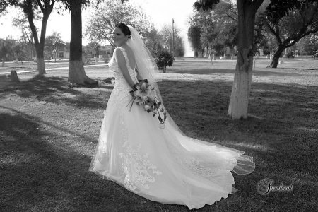 ING.  Enoé Arzate Soto el día de su boda con el Ing. Israel Omar Alvarado Medina.

Sandoval Fotografía