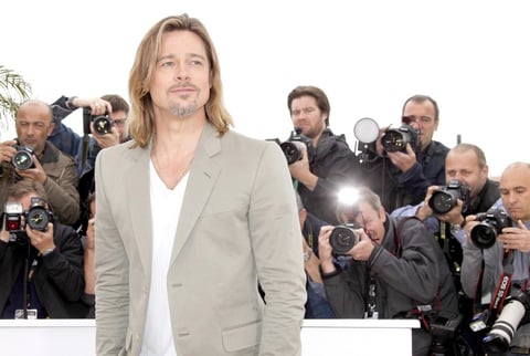 Brad Pitt revolucionó el Festival de Cannes, al que llegó sin la compañía de Angelina Jolie y, aunque negó que tengan fecha de boda, sí aseguró que les gustaría fijarla.
