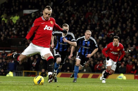 Dimitar Berbatov del Manchester United se ubica en el número 11 con 72 anotaciones. (EFE)