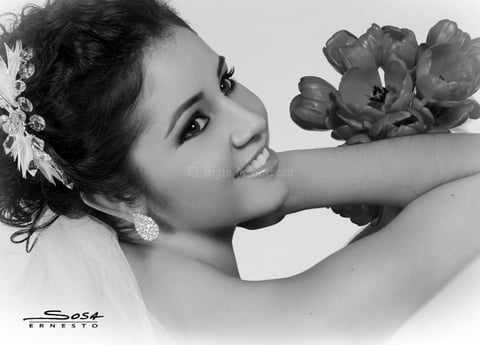 LIC. Claudia Irene Romo Serda el día de su boda con Lic. Jorge Alberto López Vie.- Studio E. Sosa