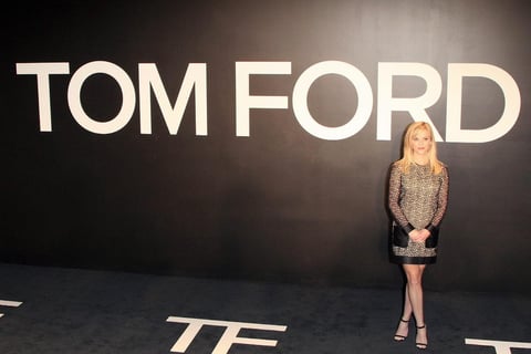 La actriz Reese Witherspoon se mostró emocionada de que Tom Ford trajera su desfile a Los Ángeles previo a la ceremonia de los Oscar.