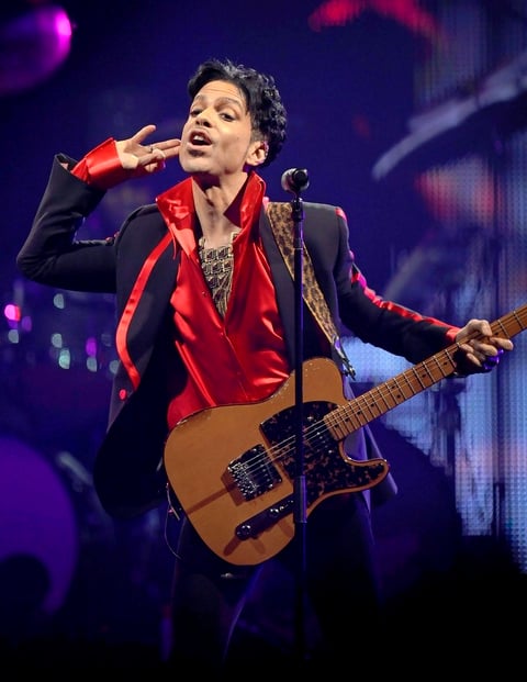Entre sus éxitos se encuentran los hits Little Red Corvette, Let's Go Crazy y When Doves Cry.