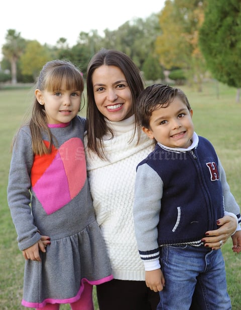 Marian con sus hijos, Victoria y Santiago