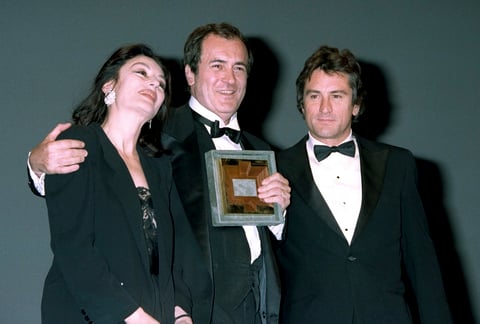 Su carrera internacional llegó con El último tango en París, que le supuso dos nominaciones al Premio Óscar como Mejor Director y Mejor Actor en 1973, y ese mismo año, también recibió otras dos nominaciones en los Globos de Oro, a la Mejor Película y al Mejor Director.