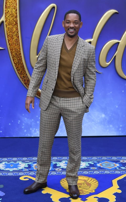 Caminan por 'la alfombra de Aladdín' en el estreno de Londres