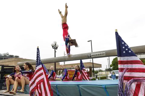 Fourth of July

Gymnasts from Gionastics Gymnastics take turns balancing on a balance beam Thursday, July 4, 2019, as their float moves down Elizabeth Street during the Brownsville Herald 's 19th annual Salute to Freedom Fourth of July parade in Brownsville, Texas. (Denise Cathey/The Brownsville Herald via AP)