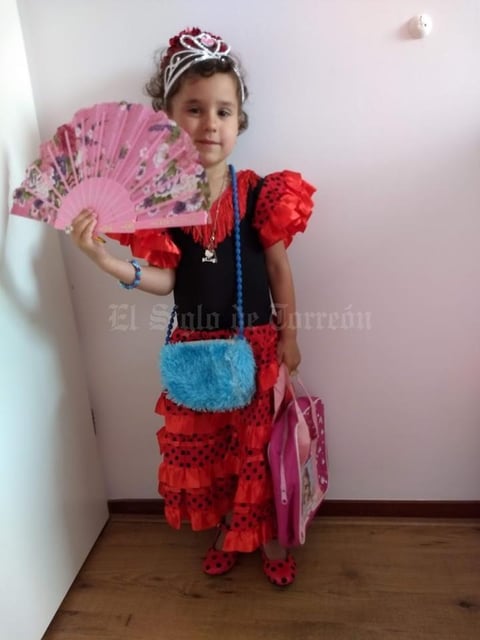 09072019 MUY LINDA.  Isabel, de sevillana.