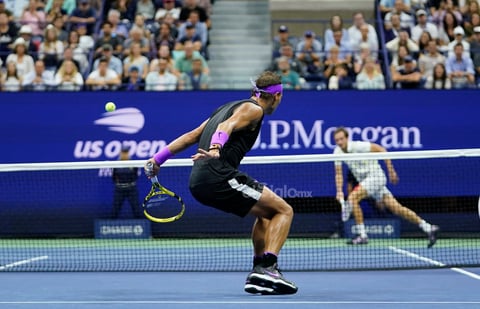US Open Tennis

Rafael Nadal, of Spain, returns a shot to Daniil Medvedev, of Russia, during the men's singles final of the U.S. Open tennis championships Sunday, Sept. 8, 2019, in New York. (AP Photo/Eduardo Munoz Alvarez)