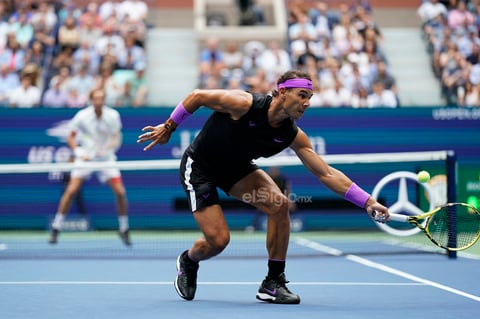 US Open Tennis

Rafael Nadal, of Spain, returns a shot to Daniil Medvedev, of Russia, during the men's singles final of the U.S. Open tennis championships Sunday, Sept. 8, 2019, in New York. (AP Photo/Eduardo Munoz Alvarez)