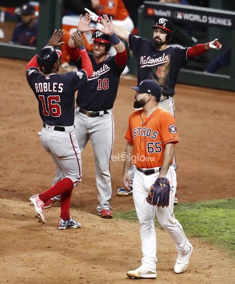 Washington Nationals at Houston Astros


Houston (United States), 31/10/2019.- Washington Nationals (L-R) Victor Robles and Yan Gomes celebrate with Anthony Rendon after batter Adam Eaton hits a two-run single against the Houston Astros in the top of the ninth inning of their MLB 2019 World Series game seven at Minute Maid Park in Houston, Texas, USA, 30 October 2019. The best-of-seven series is tied 3-3 and game seven will decide the series winner. (Estados Unidos) EFE/EPA/LARRY W. SMITH

DEP Béisbol TEXAS HOUSTON USA BASEBALL MLB WORLD SERIES United States