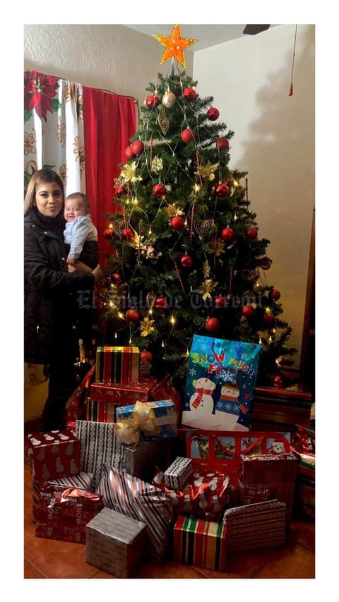 29122019 DISFRUTAN DE LA NAVIDAD.  América y su hijo Efrén Trujillo.
