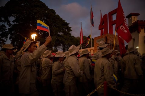 Un grupo de milicianos participa el martes 4 de febrero en una manifestación de Gobierno.