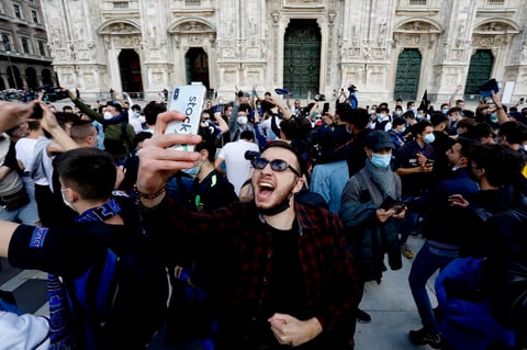 Inter supporters celebrate winning Italian Serie A