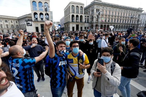 Inter supporters celebrate winning Italian Serie A