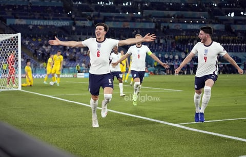 Quarter Final Ukraine vs England

Rome (Italy), 03/07/2021.- Harry Maguire (L) of England celebrates after scoring his team's second goal during the UEFA EURO 2020 quarter final match between Ukraine and England in Rome, Italy, 03 July 2021. (Italia, Ucrania, Roma) EFE/EPA/Alessandra Tarantino / POOL (RESTRICTIONS: For editorial news reporting purposes only. Images must appear as still images and must not emulate match action video footage. Photographs published in online publications shall have an interval of at least 20 seconds between the posting.)
DEP Fútbol ROME ITALY SOCCER UEFA EURO 2020 Italy