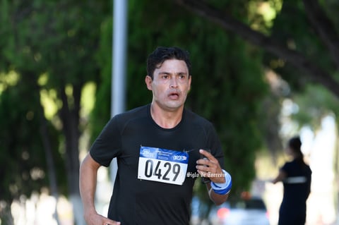 Fotos de la Carrera 21k autocentro autopop 2021, décimo aniversario