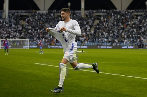 Real Madrid's Federico Valverde celebrates after a goal during the Spanish Super Cup semi final soccer match between Barcelona and Real Madrid at King Fahd stadium in Riyadh, Saudi Arabia, Thursday, Jan. 13, 2022. (AP Photo/Hassan Ammar)
