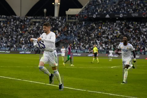 Real Madrid's Federico Valverde celebrates after a goal during the Spanish Super Cup semi final soccer match between Barcelona and Real Madrid at King Fahd stadium in Riyadh, Saudi Arabia, Thursday, Jan. 13, 2022. (AP Photo/Hassan Ammar)